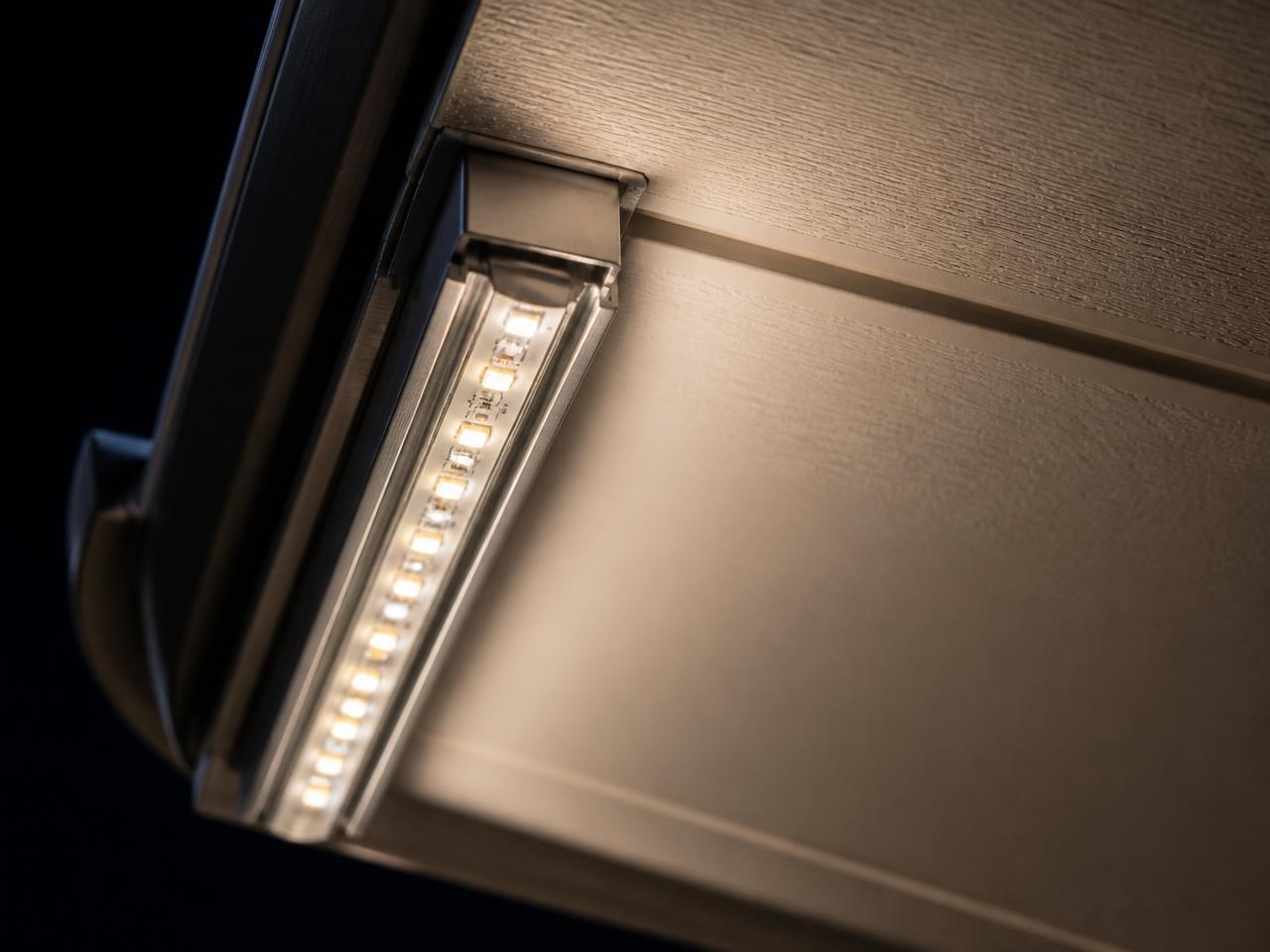 Close-up of the slim lighting channel fitted under a home's roofline